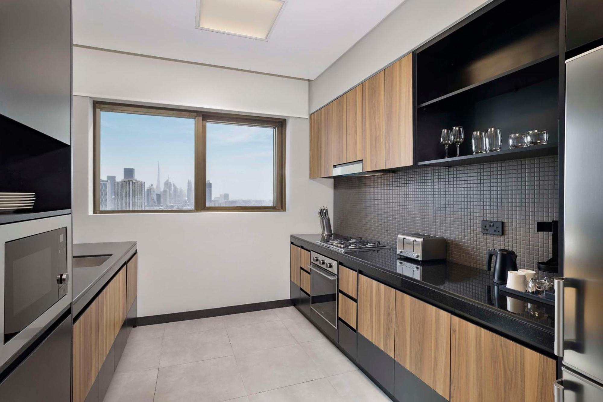 فندق ووحدات دبل تري من هيلتون دبي إم سكوير المظهر الخارجي الصورة A typical kitchen