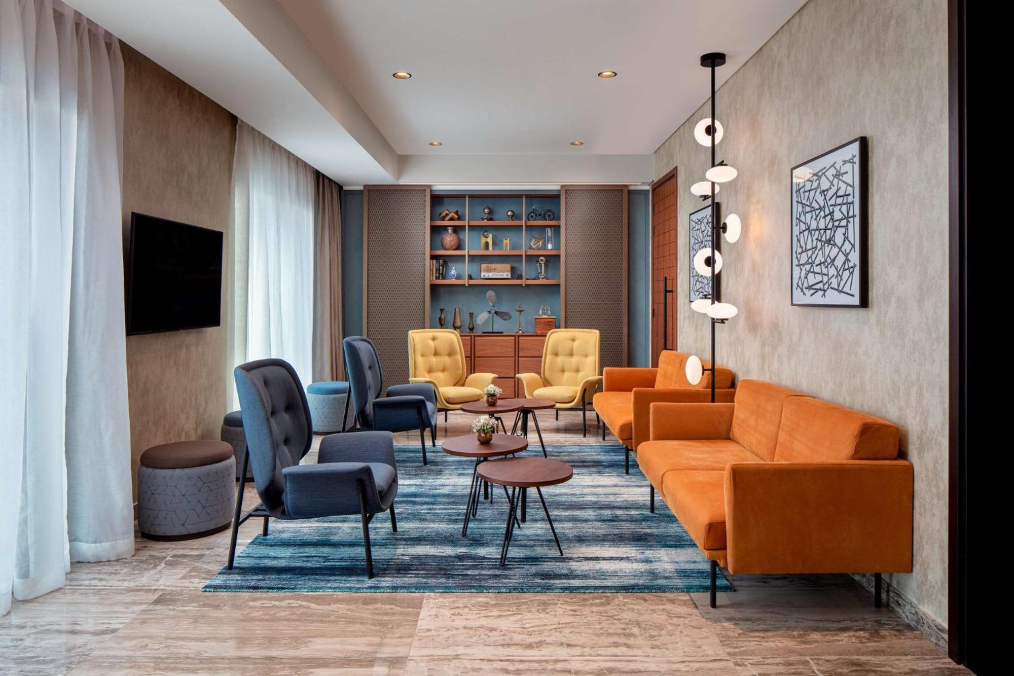 فندق ووحدات دبل تري من هيلتون دبي إم سكوير المظهر الخارجي الصورة The lounge at the hotel