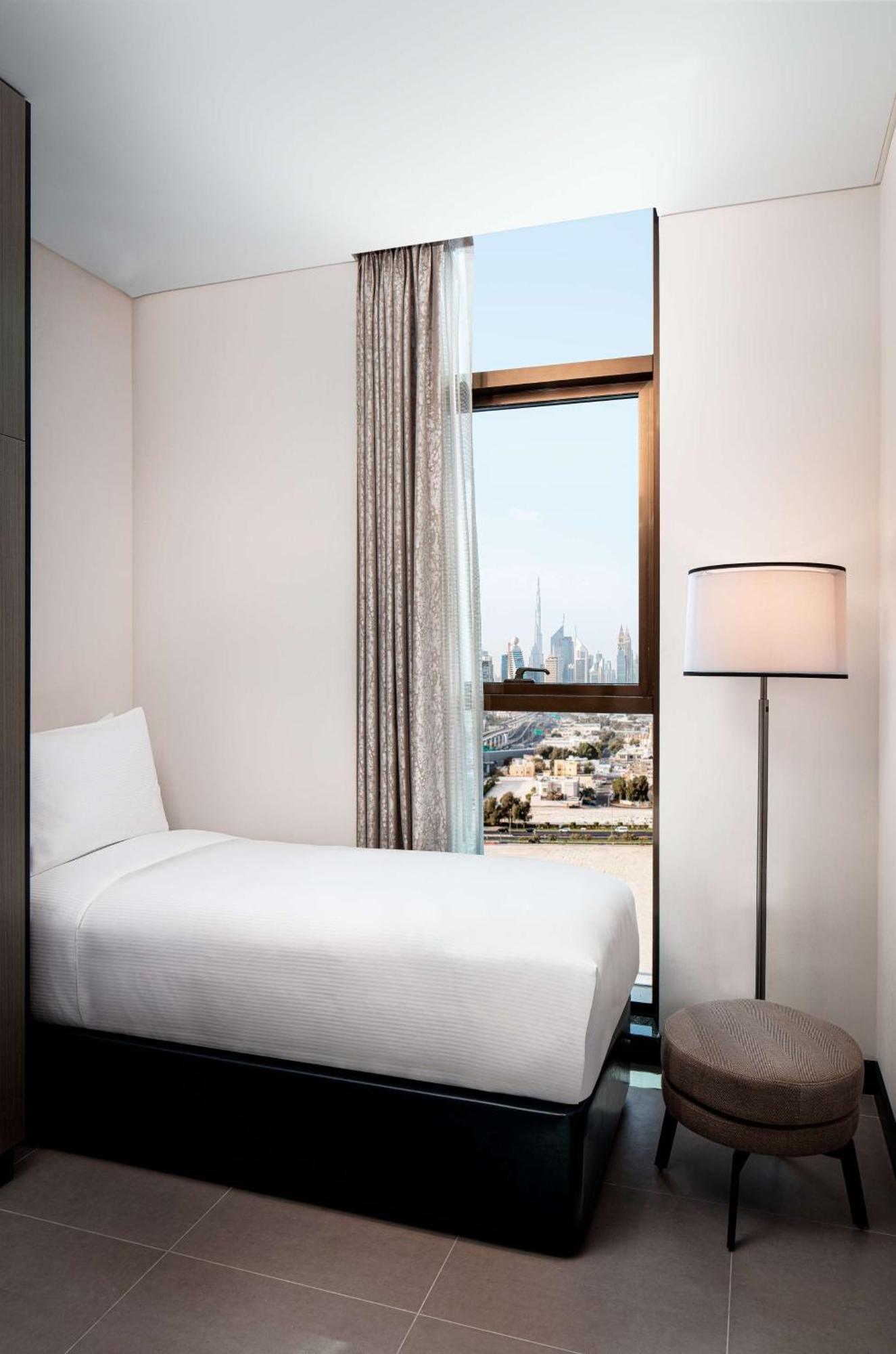 فندق ووحدات دبل تري من هيلتون دبي إم سكوير المظهر الخارجي الصورة A single room at the hotel