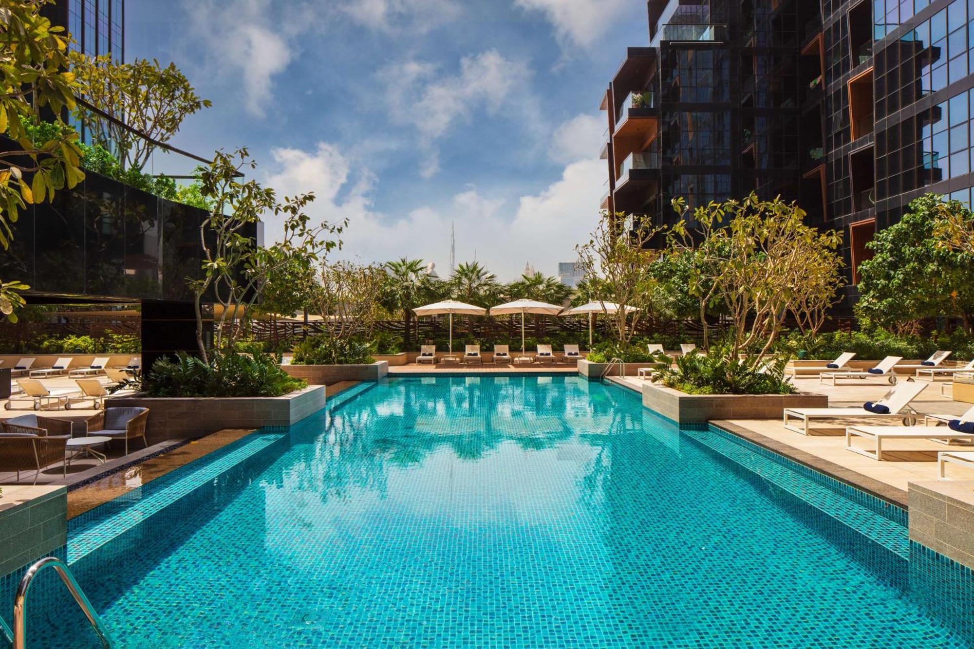 فندق ووحدات دبل تري من هيلتون دبي إم سكوير المظهر الخارجي الصورة The swimming pool at The Hari